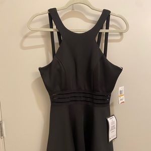 Black dress with strap details